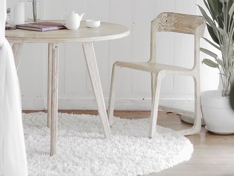 Dining area with weathered light furniture