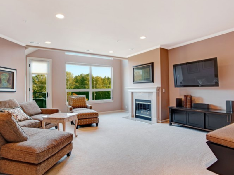 Living room area with fireplace and traditional furniture