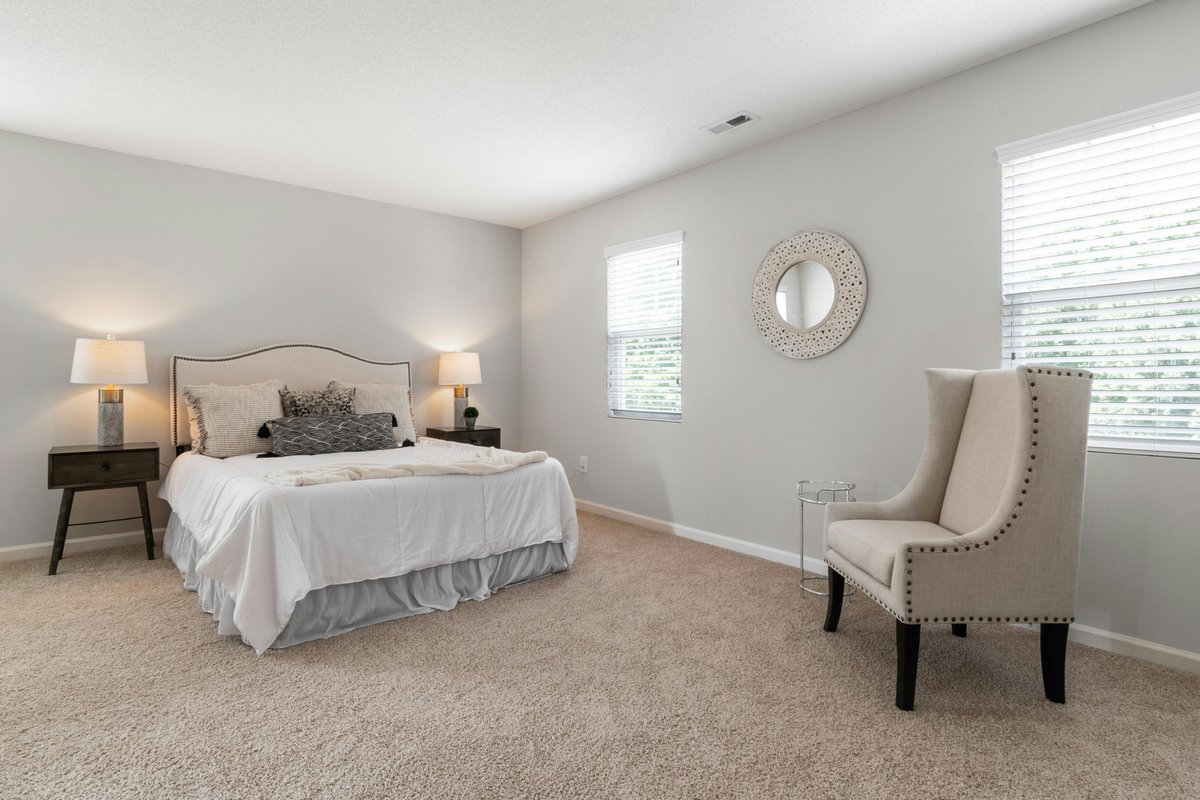 Wall to Wall beige carpet in a bedroom