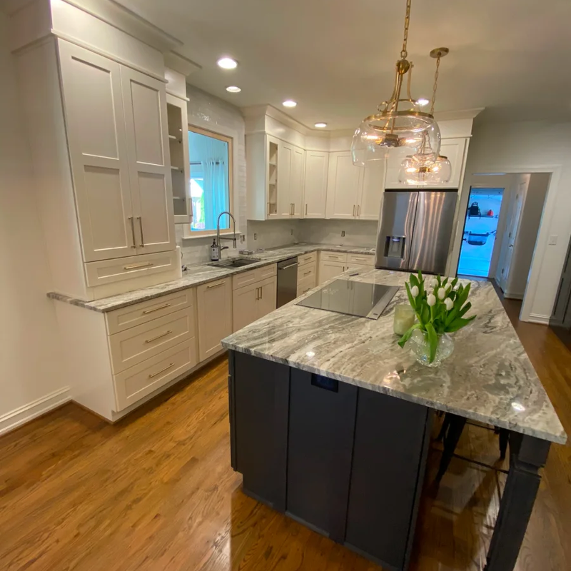 Kitchen remodel with granite countertops and white cabinets