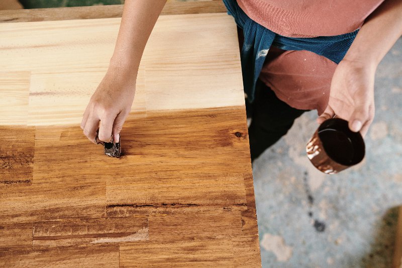 Carpenter staining wood