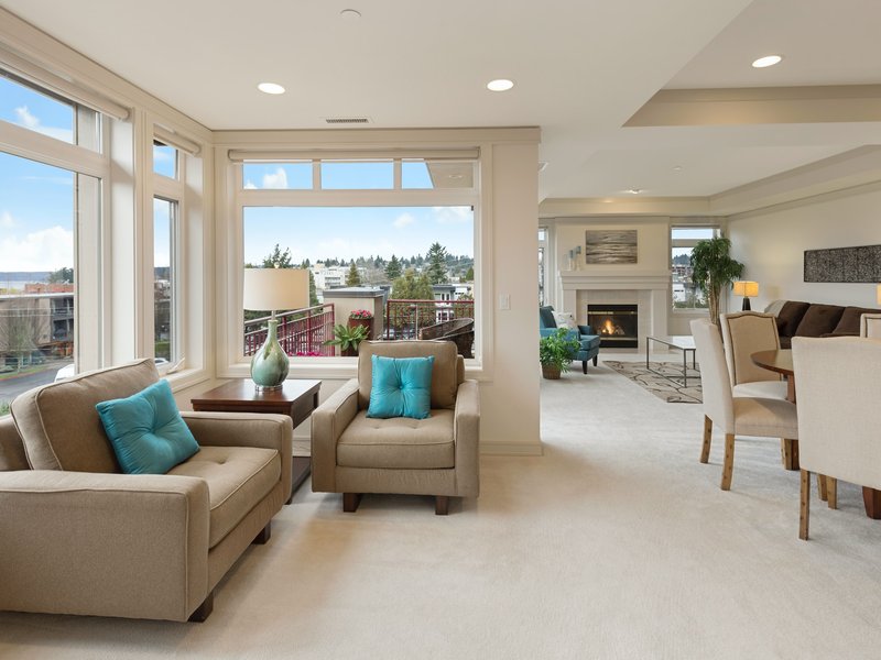 Soft ivory carpet floors in a condo seating area