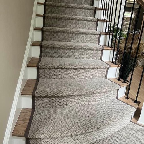 Carpeting on stairs by Bridgeport Carpet, Hardwood and Tile